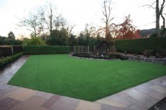 Garden redeveloped with paving stone and Artificial Grass